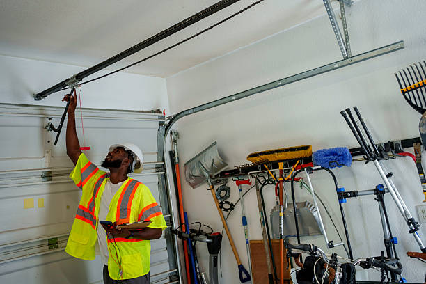 Professional Garage Door Panel Replacement technician working in Quincy, MA